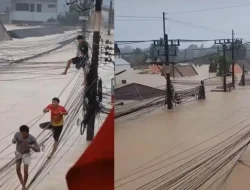 Viral Warga Thailand Meniti Kabel Listrik di Atas Banjir Bandang
